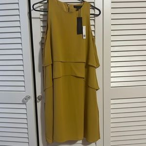 Mustard yellow colored New with tags Banana Republic dress with pockets